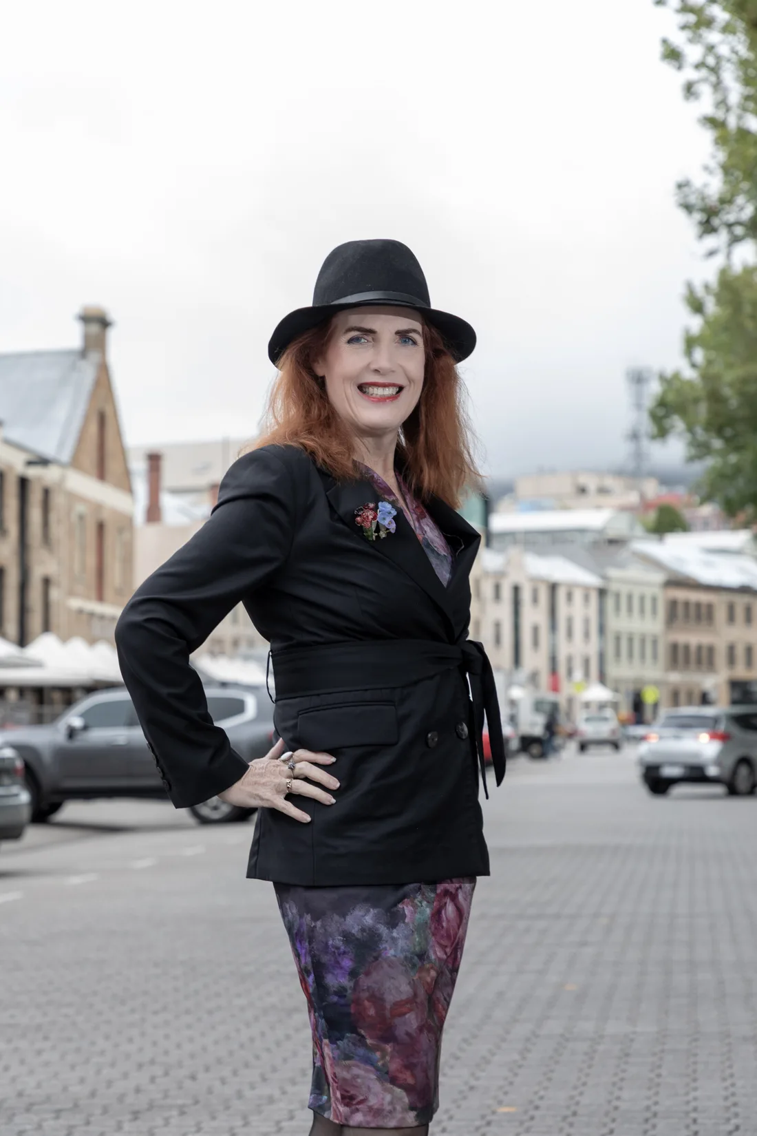 Louise Bloomfield in Salamanca Place, Hobart, with kunanyi behind her